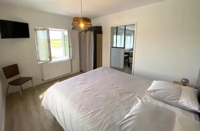 Un ou plusieurs lits dans un hébergement de l'établissement Saint-Pol maison familiale avec jardin équipée à neuf 12 personnes
