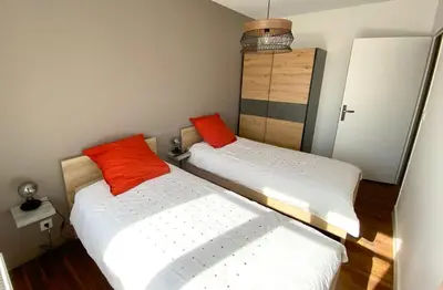 Un ou plusieurs lits dans un hébergement de l'établissement Saint-Pol maison familiale avec jardin équipée à neuf 12 personnes
