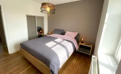 Un ou plusieurs lits dans un hébergement de l'établissement Saint-Pol maison familiale avec jardin équipée à neuf 12 personnes