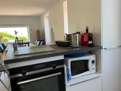 Cuisine ou kitchenette dans l'établissement Magnifique villa face à la plage de Pors Peron
