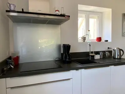 Cuisine ou kitchenette dans l'établissement Magnifique villa face à la plage de Pors Peron