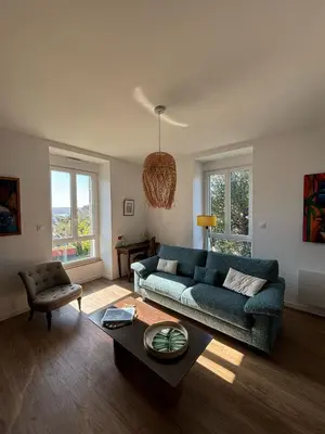 Coin salon dans l'établissement Maison de Kerangall Brest appartement jardin et parking