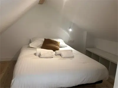 Un ou plusieurs lits dans un hébergement de l'établissement La cabine du bout du monde avec Mezzanine - Ile de Sein - votre maison de vacances de haut standing - PL03