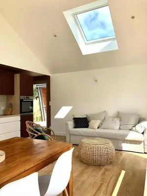 Coin salon dans l'établissement Nouveau ! La cabine du bout du monde - Le Portzic : votre maison de vacances de haut standing - PL6