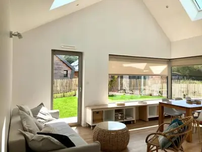 Coin salon dans l'établissement Nouveau ! La cabine du bout du monde - Le Portzic : votre maison de vacances de haut standing - PL6