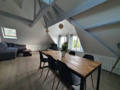 Coin salon dans l'établissement Charmant appartement proche commerces et plages