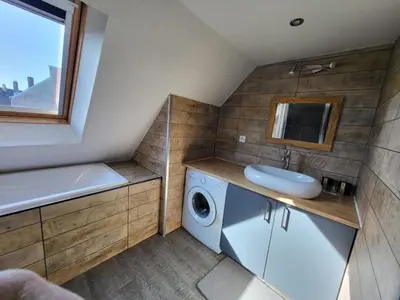 Cuisine ou kitchenette dans l'établissement Charmant appartement proche commerces et plages