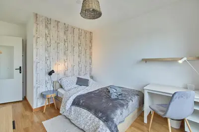 Un ou plusieurs lits dans un hébergement de l'établissement Appartement avec belle vue dégagée du 11e étage