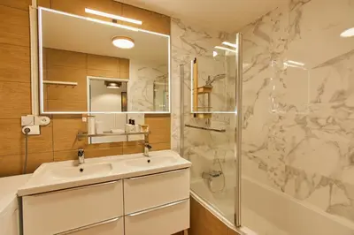 Salle de bains dans l'établissement Appartement avec belle vue dégagée du 11e étage