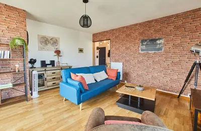 Coin salon dans l'établissement Appartement avec belle vue dégagée du 11e étage