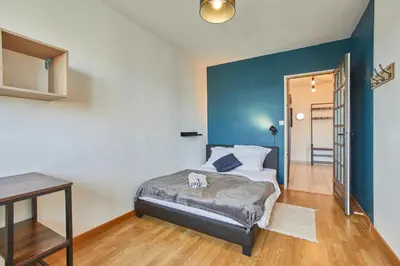 Un ou plusieurs lits dans un hébergement de l'établissement Appartement avec belle vue dégagée du 11e étage