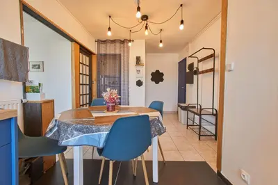 Coin salon dans l'établissement Appartement avec belle vue dégagée du 11e étage