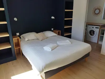 Un ou plusieurs lits dans un hébergement de l'établissement La cabine du bout du monde avec Mezzanine PL04, Tevennec - votre maison de vacances de haut standing