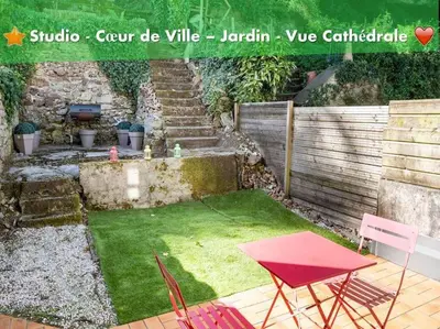 Jardin de l'établissement oo Le jardin oo paisible studio équipé et bien placé
