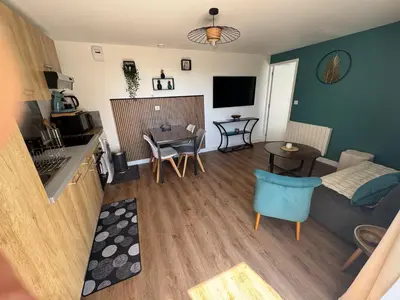 Coin salon dans l'établissement Logement avec terrasse et parking