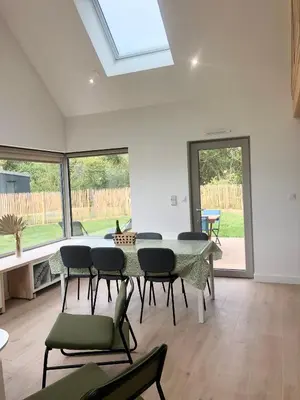 Coin salon dans l'établissement La cabine du bout du monde avec Mezzanine , votre maison de vacances de haut standing