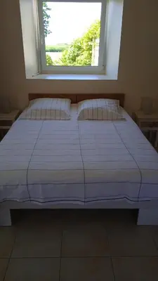 Un ou plusieurs lits dans un hébergement de l'établissement La Maison de Lésa