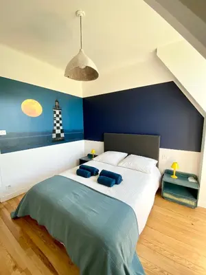 Un ou plusieurs lits dans un hébergement de l'établissement Superbe villa vue sur mer, corniche de la plage