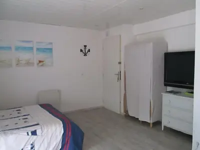 Télévision ou salle de divertissement dans l'établissement A 350m de la plage