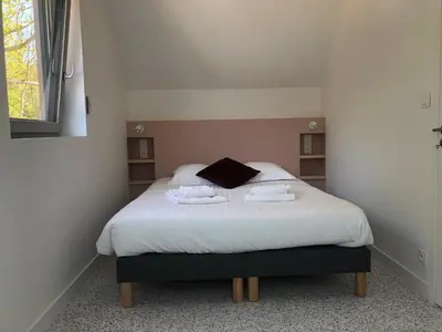 Un ou plusieurs lits dans un hébergement de l'établissement Les cabines du bout du monde - Cabine Duplex , votre maison de vacances de haut standing à Crozon