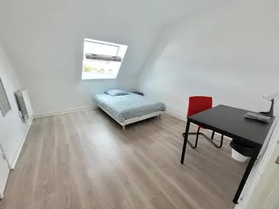 Un ou plusieurs lits dans un hébergement de l'établissement 1 chambre privée dans maison de ville
