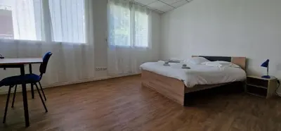 Un ou plusieurs lits dans un hébergement de l'établissement Aerouant - Maison spacieuse pour 8 personnes sur 3 étages Idéal famille amis entreprises