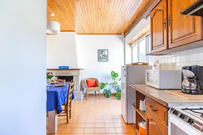 Cuisine ou kitchenette dans l'établissement Loustic