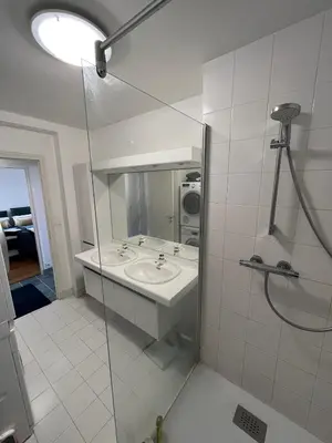 Salle de bains dans l'établissement Appartement - vue mer