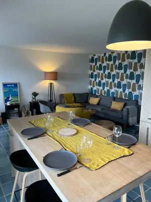 Coin salon dans l'établissement Appartement - vue mer