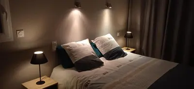 Un ou plusieurs lits dans un hébergement de l'établissement maison de la plage des Amiets
