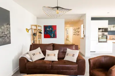 Coin salon dans l'établissement Appartement 4 personnes avec vue mer