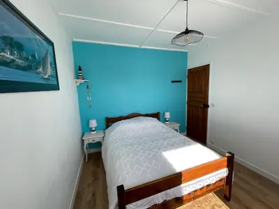 Un ou plusieurs lits dans un hébergement de l'établissement Villa Honey Moon