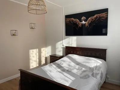 Un ou plusieurs lits dans un hébergement de l'établissement Villa Honey Moon