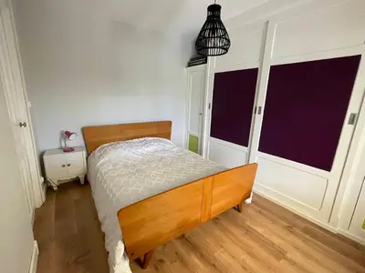 Un ou plusieurs lits dans un hébergement de l'établissement Villa Honey Moon