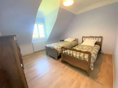 Un ou plusieurs lits dans un hébergement de l'établissement Grande maison 4* à Beg Meil avec jardin, à 1 km de la plage - FR-1-481-119