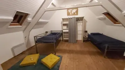 Un ou plusieurs lits dans un hébergement de l'établissement Le Kerdidrouz du Léon 3 chambres, draps fournis, Wi-FI