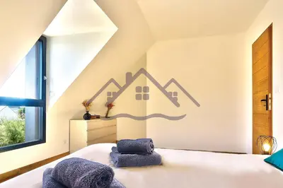 Un ou plusieurs lits dans un hébergement de l'établissement LocaLise - M68 - An Aod Melen - Maison neuve à 50m de la plage et à quelques pas du centre et des plages - Draps inclus - Wifi inclus
