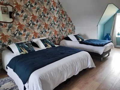 Un ou plusieurs lits dans un hébergement de l'établissement Chambres d'Hôtes 