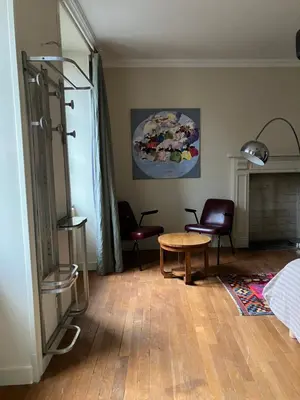 Coin salon dans l'établissement Contes à Rebours - Chambres d'hôtes