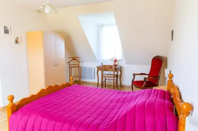 Un ou plusieurs lits dans un hébergement de l'établissement Maison pour 6 au coeur du Pays Bigouden
