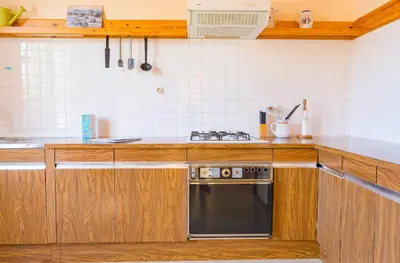 Cuisine ou kitchenette dans l'établissement Maison de famille pour 6 personnes