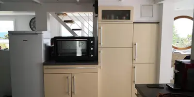 Cuisine ou kitchenette dans l'établissement Ty Mor