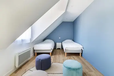 Coin salon dans l'établissement Les Peupliers - maison de vacances avec jardin