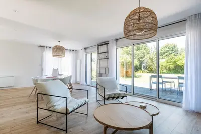 Coin salon dans l'établissement Les Peupliers - maison de vacances avec jardin