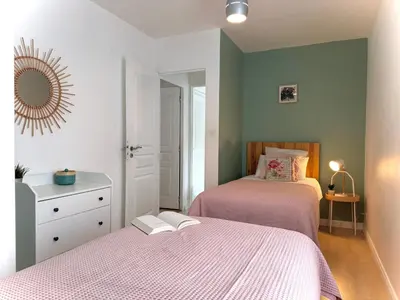 Un ou plusieurs lits dans un hébergement de l'établissement Orloucie - Maison de charme avec jardin clos, Calme, Abers, plages à 10 min