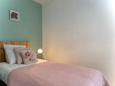 Un ou plusieurs lits dans un hébergement de l'établissement Orloucie - Maison de charme avec jardin clos, Calme, Abers, plages à 10 min