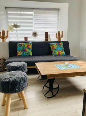Coin salon dans l'établissement La p’tite maison de locqui