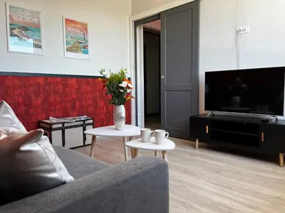 Télévision ou salle de divertissement dans l'établissement Lostendro, appartements vue port