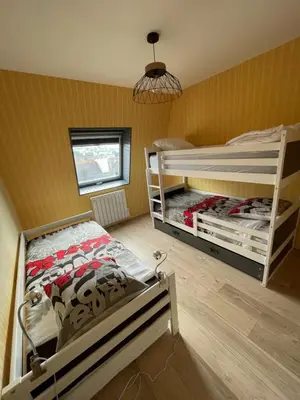 Un ou plusieurs lits dans un hébergement de l'établissement Bel appartement au coeur du quartier des artistes