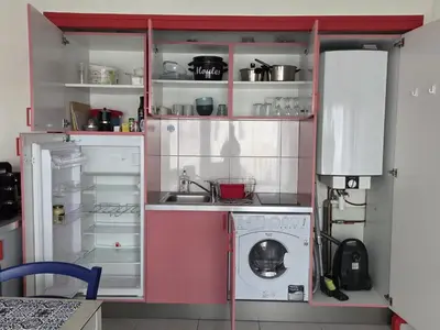 Cuisine ou kitchenette dans l'établissement Studio proche plages